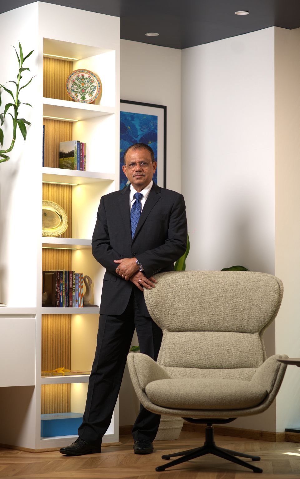 Eastern Indian business leader in a boardroom setting